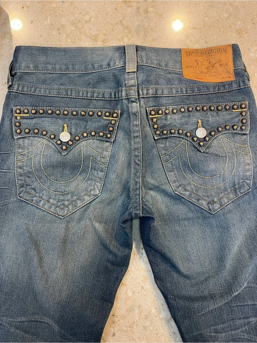 True Religion Men's Bootcut Jeans in Washed Blue with Stud Detail